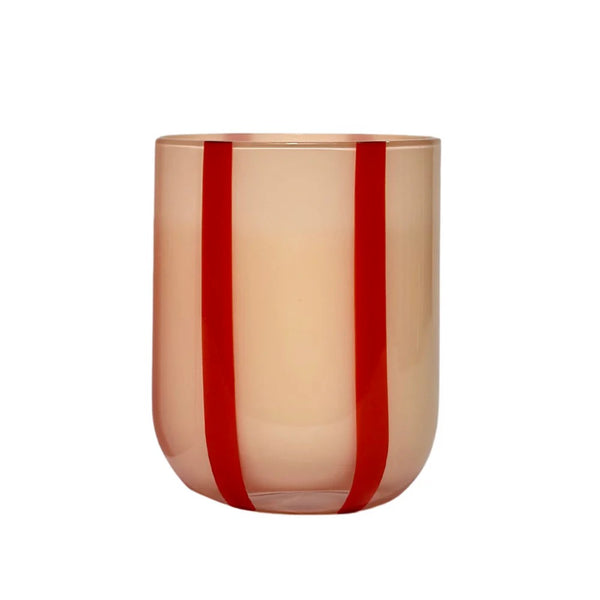Glass tumbler with red stripes on a white background