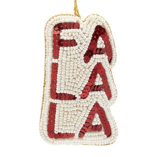 Decorative ornament with 'FALA' in red beads on a white background