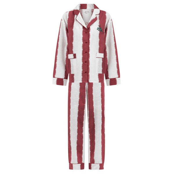 Red and white striped pajama set on a white background