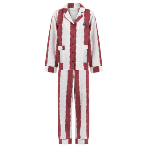 Red and white striped pajama set on a white background