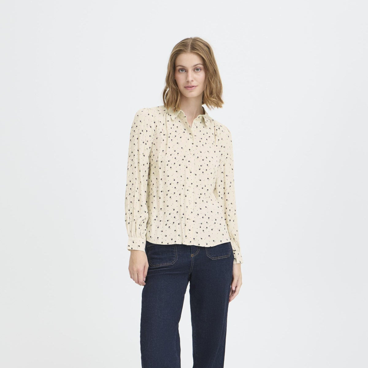 Noella floral shirt with pan collar.