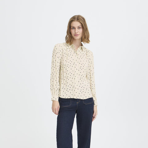Noella floral shirt with pan collar.