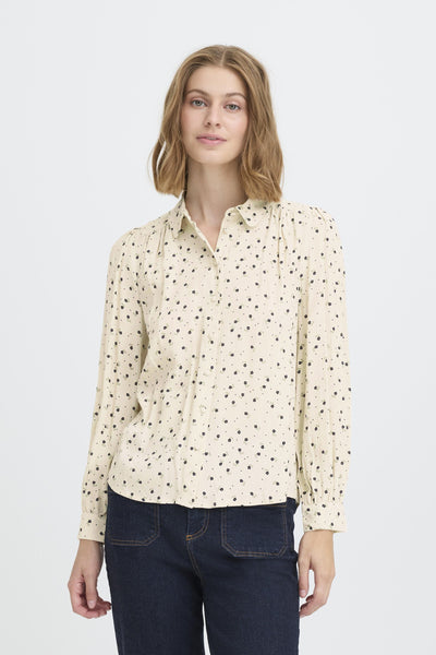  Cream blouse with a floral pattern by Atelier Reve
