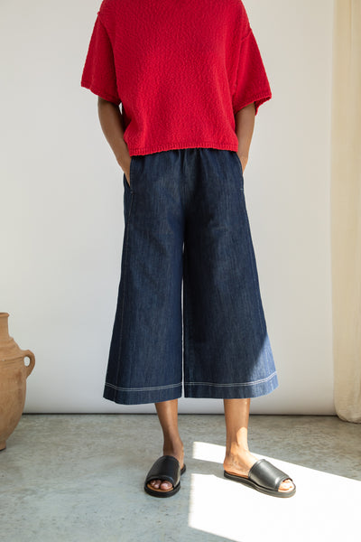 Nicole-Leigh, a classic dark denim blue wide-leg culotte style trouser from Beaumont Organic