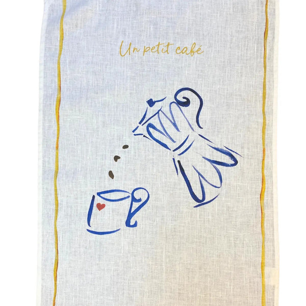 Towel with coffee pot and cup design and 'Un petit cafe' text on a white background