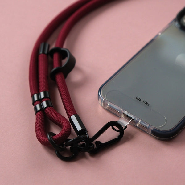 Adjustable burgundy phone lanyard strap designed for comfortable crossbody wear and easy access to your phone.