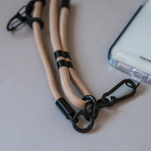 Adjustable natural beige rope phone lanyard designed for comfortable crossbody wear and easy access to your smartphone.