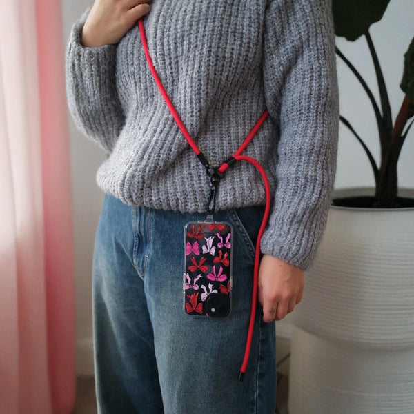 Burgundy adjustable phone lanyard with crossbody design for convenient hands-free everyday use.