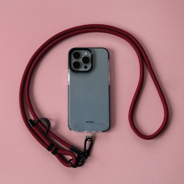 Burgundy crossbody lanyard adjustable phone strap with secure connector for hands-free smartphone carrying.