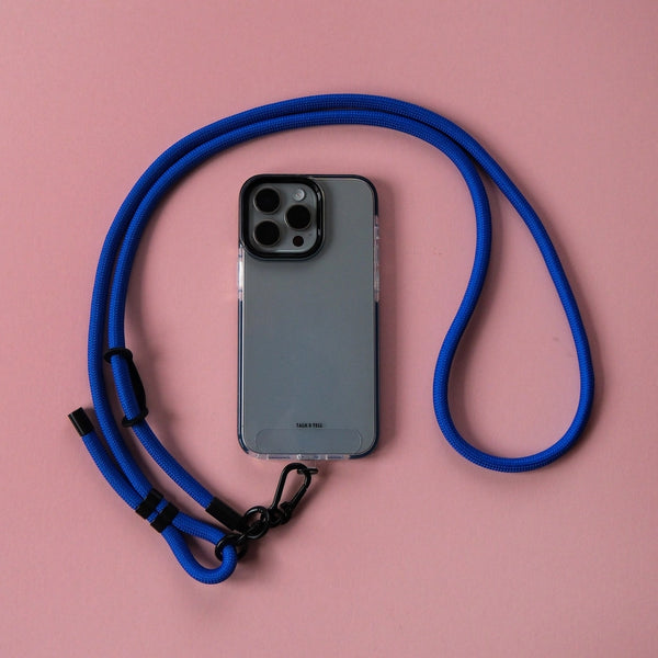 Electric blue crossbody phone strap keeping your smartphone secure and accessible while travelling, shopping, or commuting.