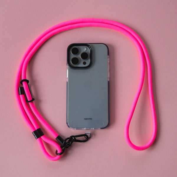 Pink crossbody lanyard phone strap with secure connector for hands-free smartphone carrying