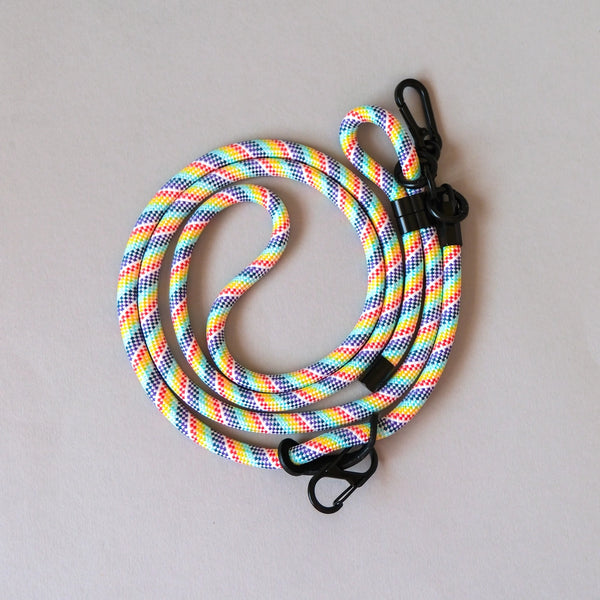 Rainbow crossbody rope phone strap keeping your smartphone secure and accessible while travelling, shopping, or commuting.