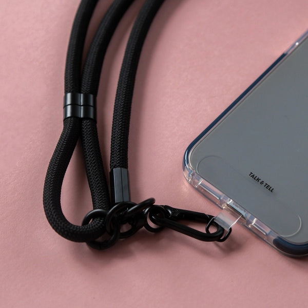 Universal black crossbody phone strap for keeping your mobile phone secure while travelling, shopping, or commuting.
