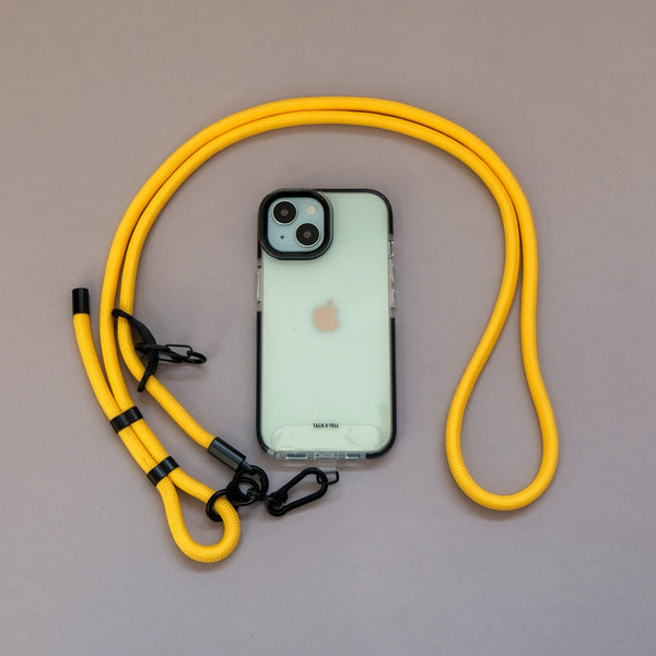 Yellow crossbody lanyard adjustable phone strap with secure connector for hands-free smartphone carrying.