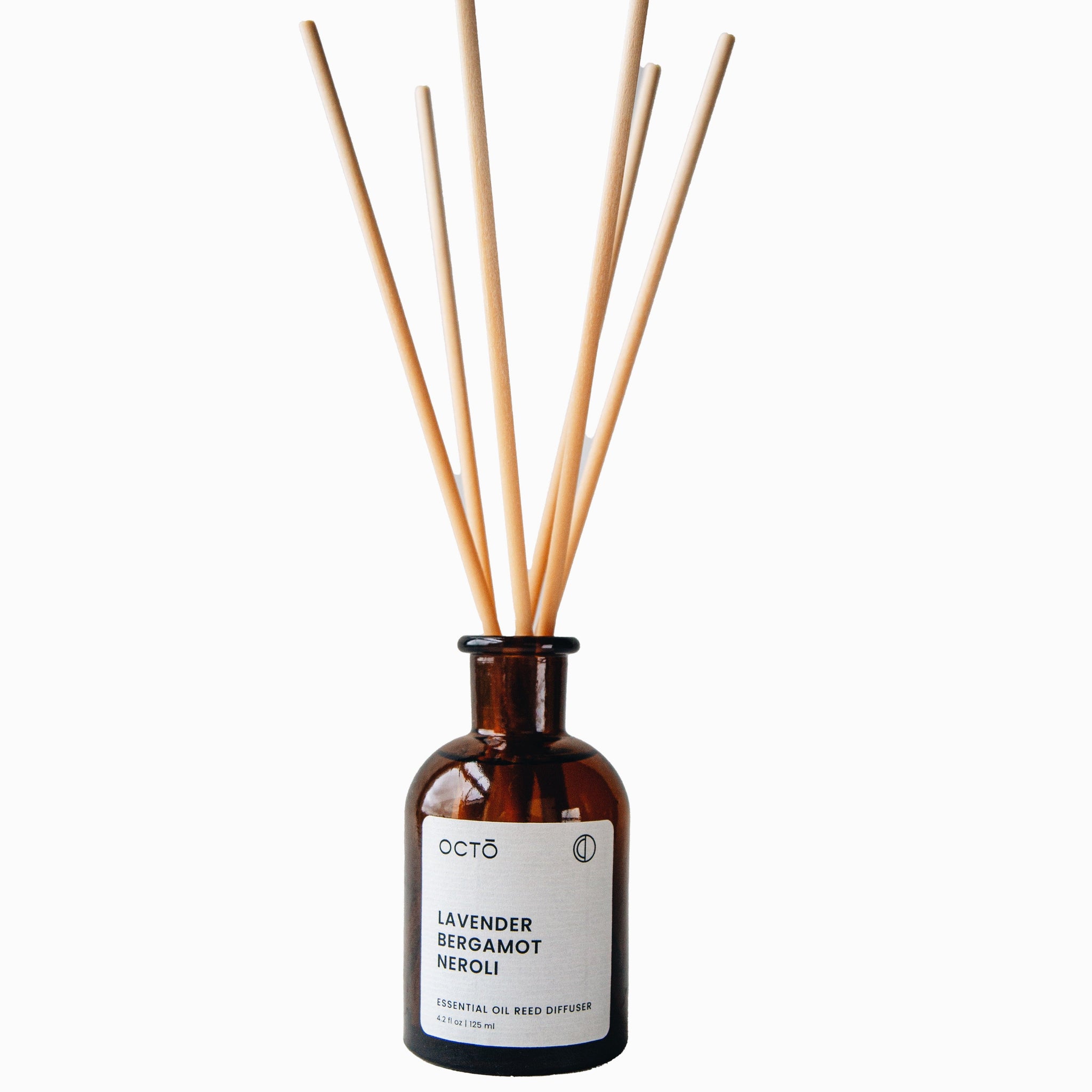 Serene lavender & bergamot reed diffuser in amber bottle by OCTO