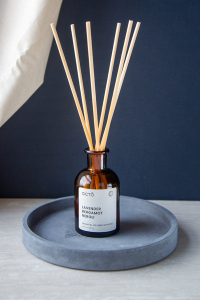 Serene lavender & bergamot reed diffuser in amber bottle by OCTO